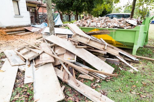 Construction site with builders waste being cleared